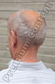 0077 Old white man wrinkless white shirt deep blue jogging…